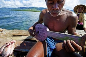 A Badjao playing rhythms to the oceans exhibits animistic view.